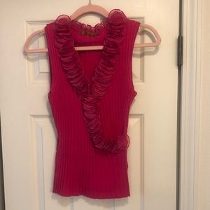 Fuchsia sleeveless sweater with ruffle. Size large.